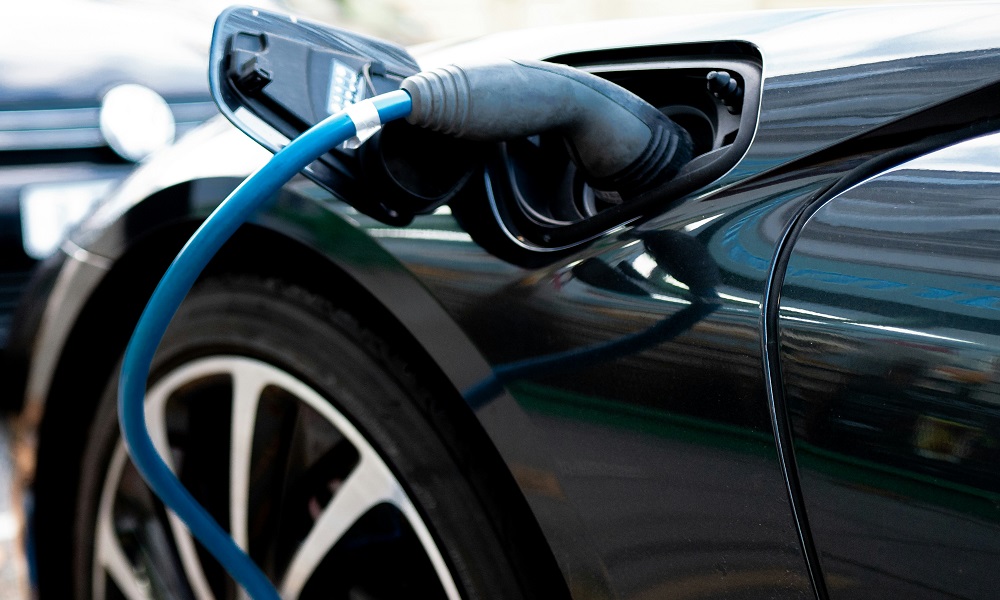 an electric car charger and electric car